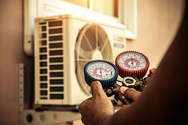 Professional Air Conditioning Service technician working in Folly Beach, SC